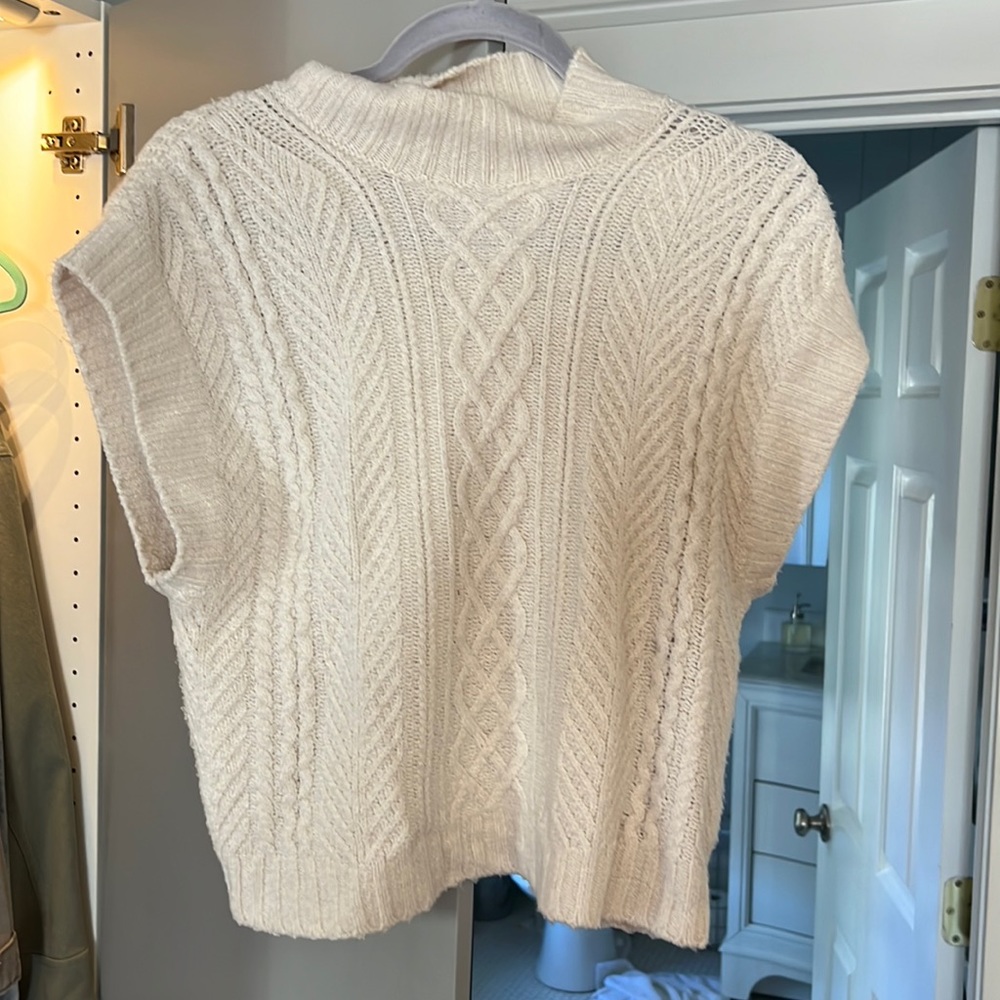 Cream colored short sleeve sweater